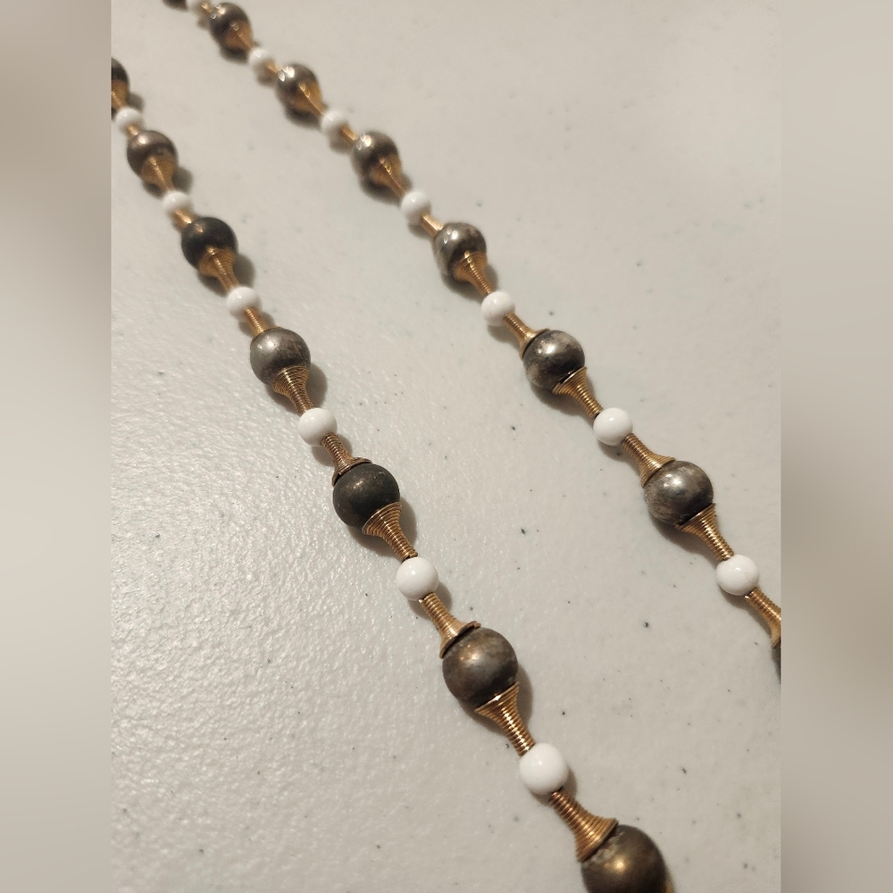 Elegant Gold and White Beaded Necklace